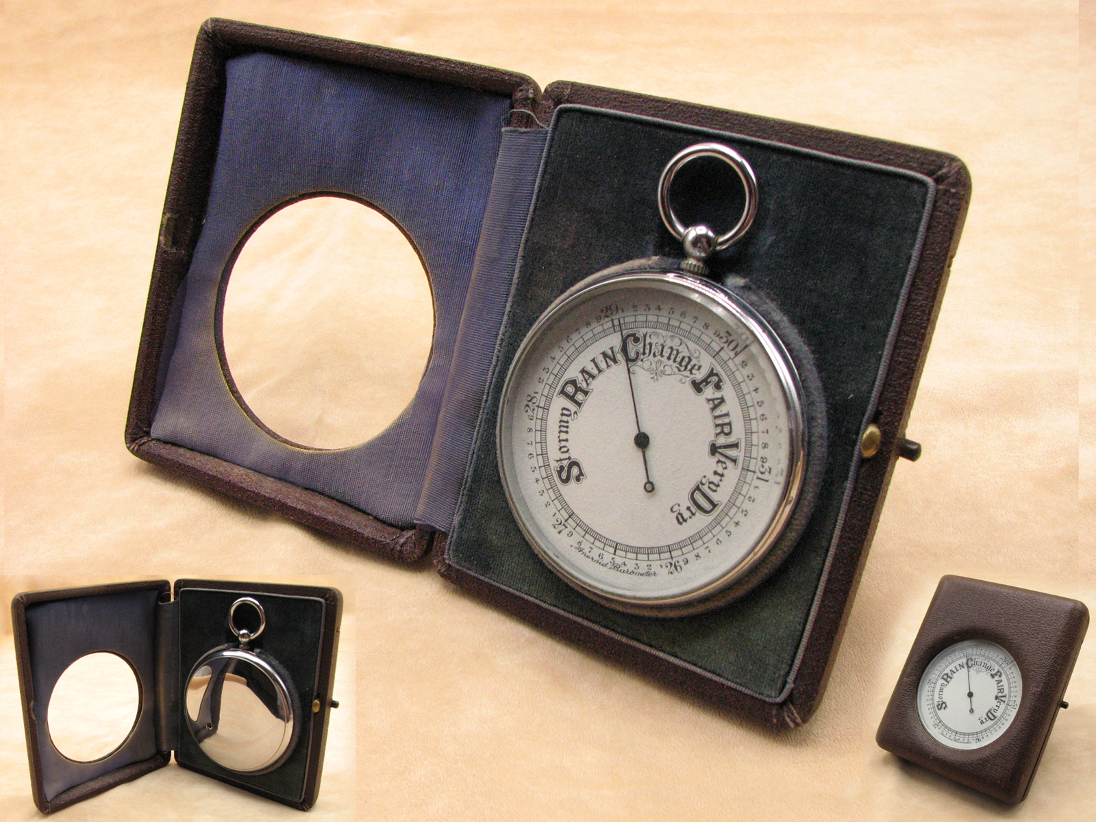 Early 20th century Goliath size pocket barometer in fitted case with stand.